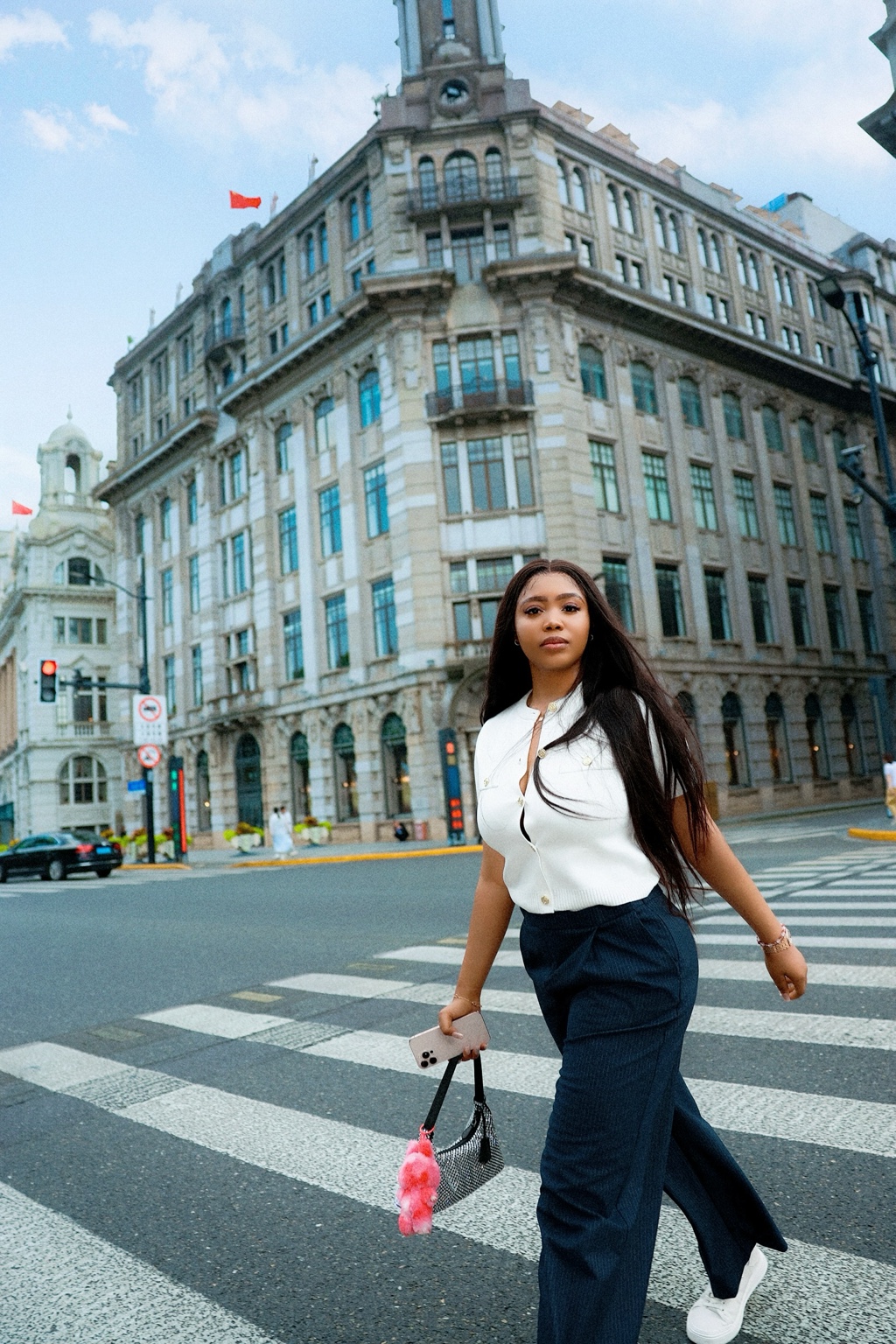 Jennifer walking through Shanghai